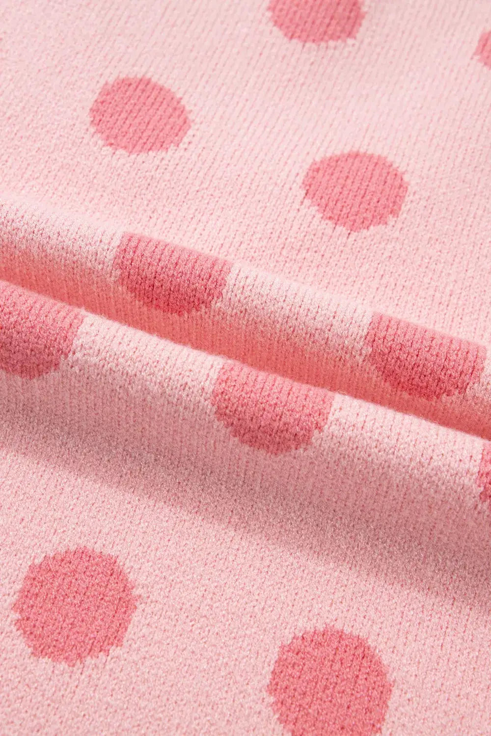 Chic polka-dot knit sweater top, pink with gentle stretch