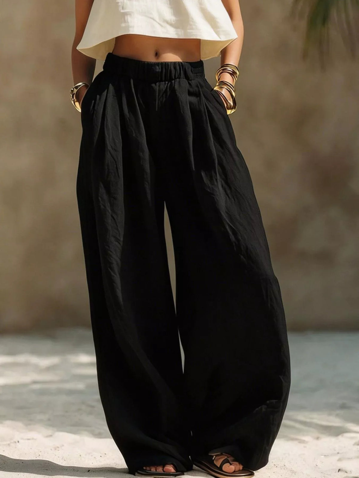 Palazzo pants, plus-size, black with elastic waistband and pockets