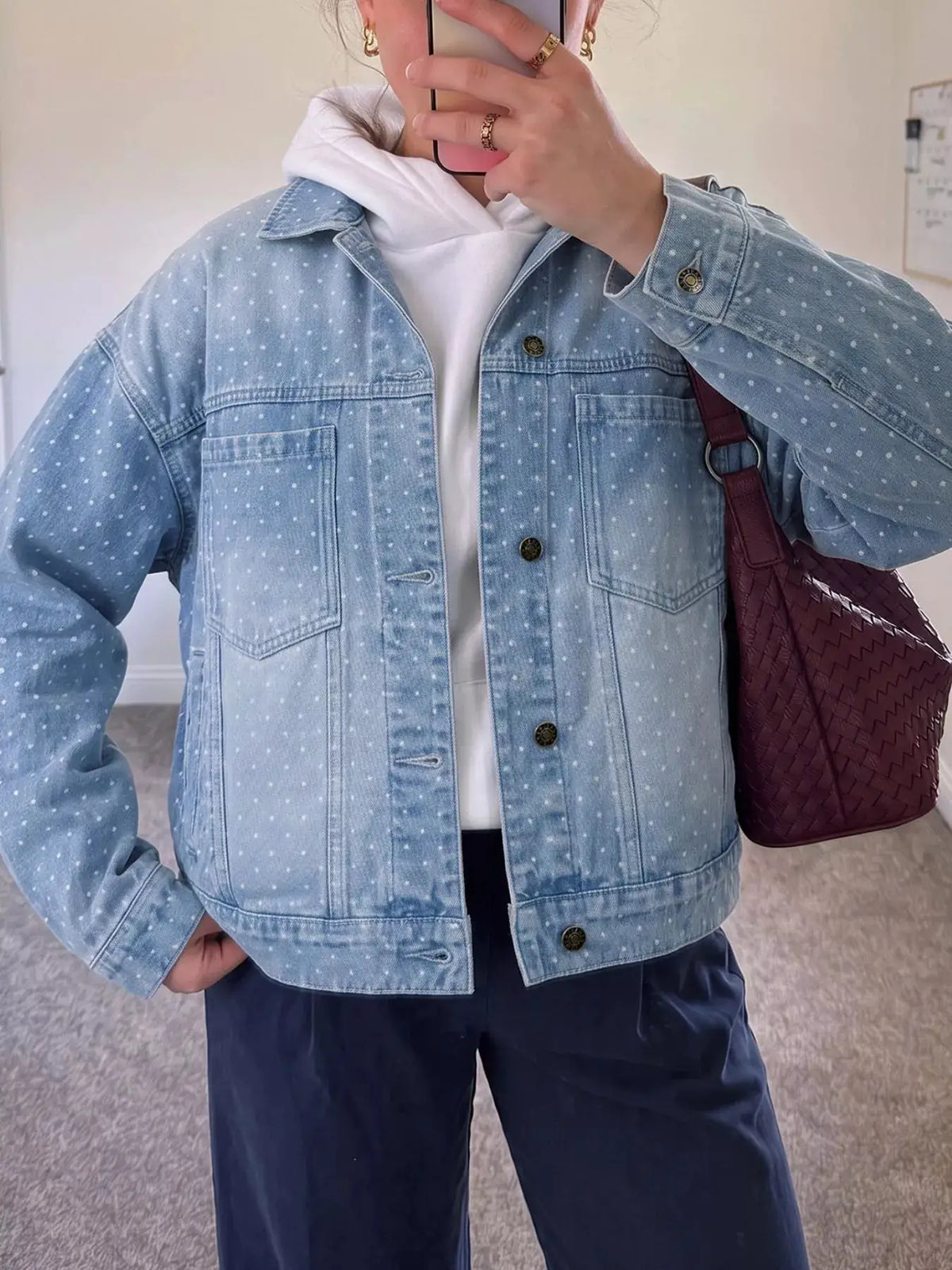 Trendsi polka dot denim jacket with front pockets, light wash blue, long sleeves.