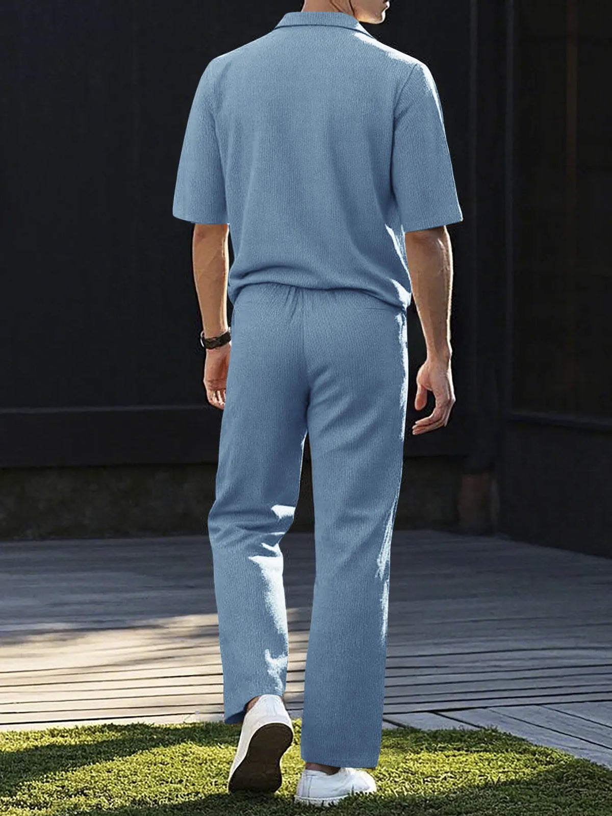 Men's full-size short-sleeve top and pants set in light blue textured knit with pockets by Trendsi