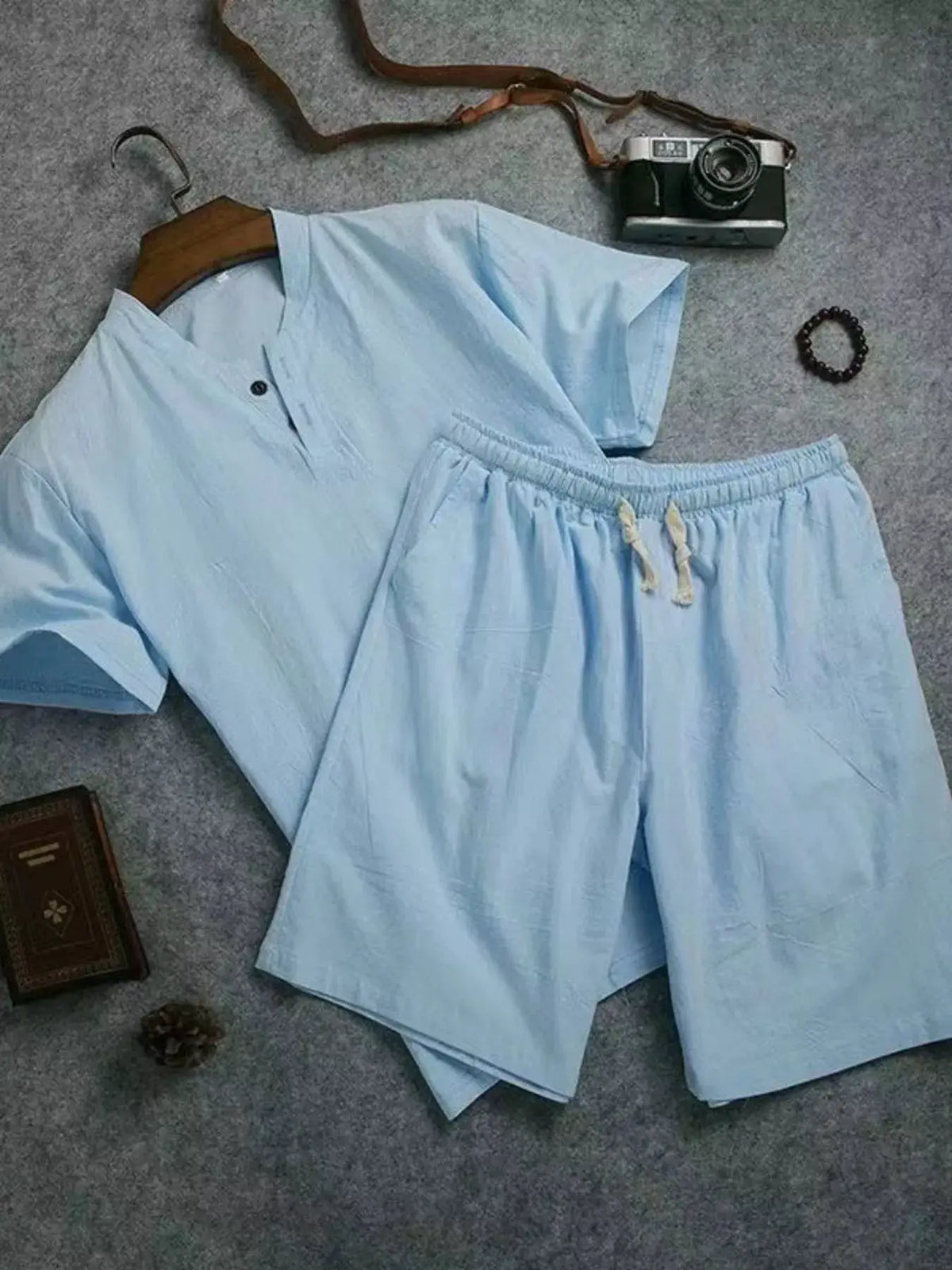 Men's plus-size cotton short-sleeve top and matching light-blue shorts set.