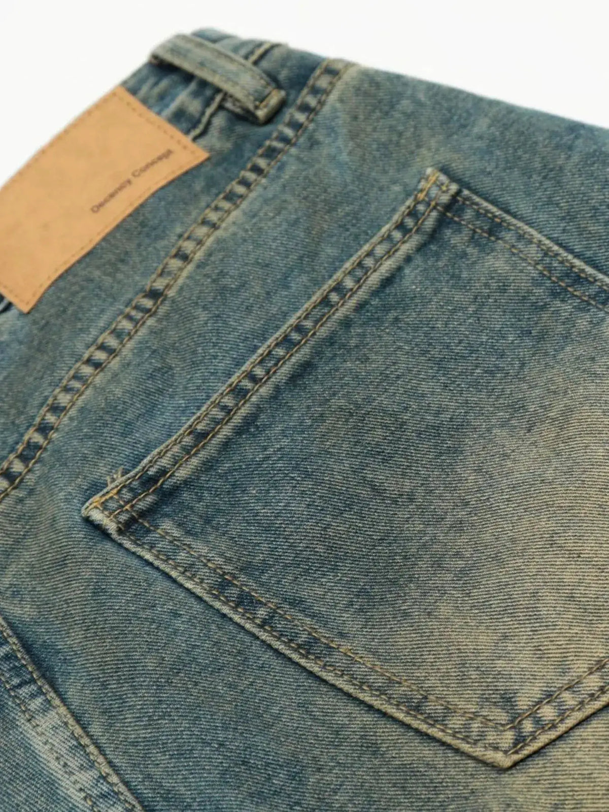 Men's denim shorts by Trendsi, blue washed denim with back pocket and tan leather patch