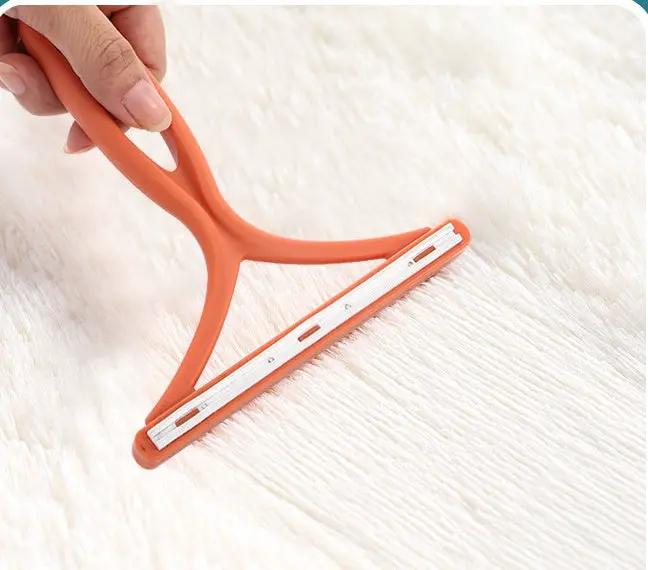 Silicone double-sided pet hair remover fabric shaver with orange handle from AdTec