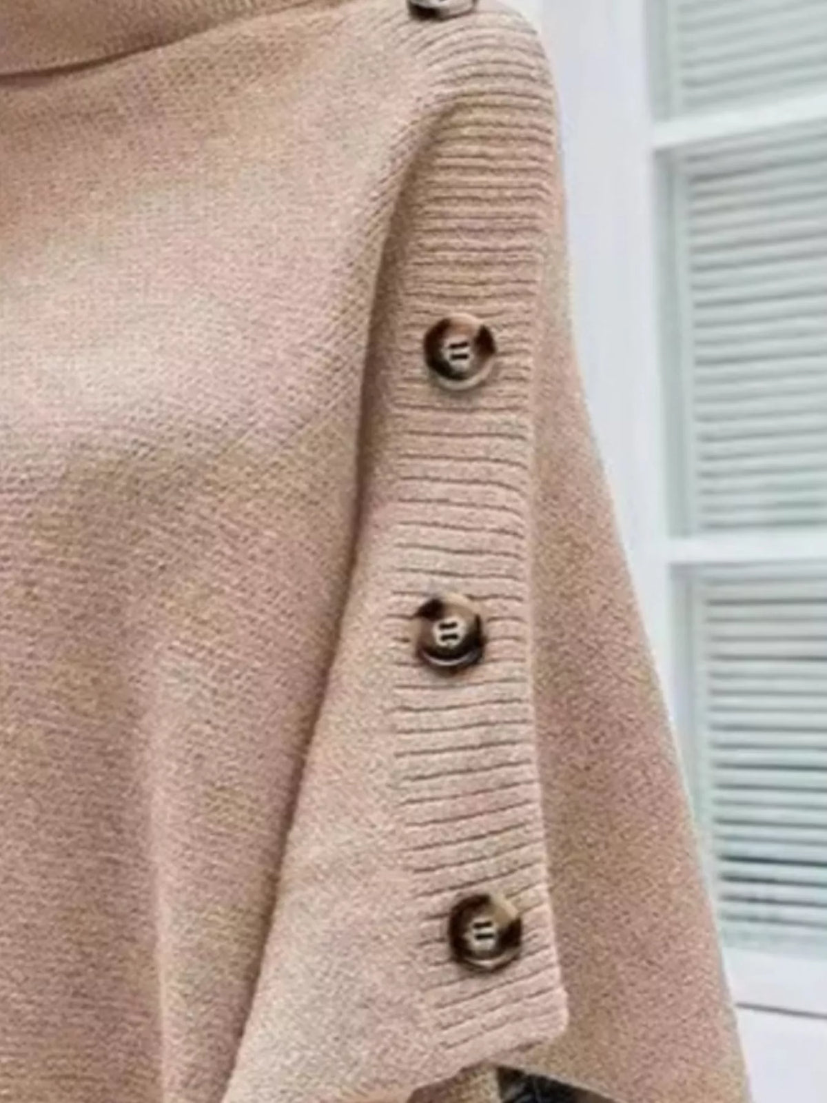 Beige knit buttoned turtleneck poncho pullover by Trendsi