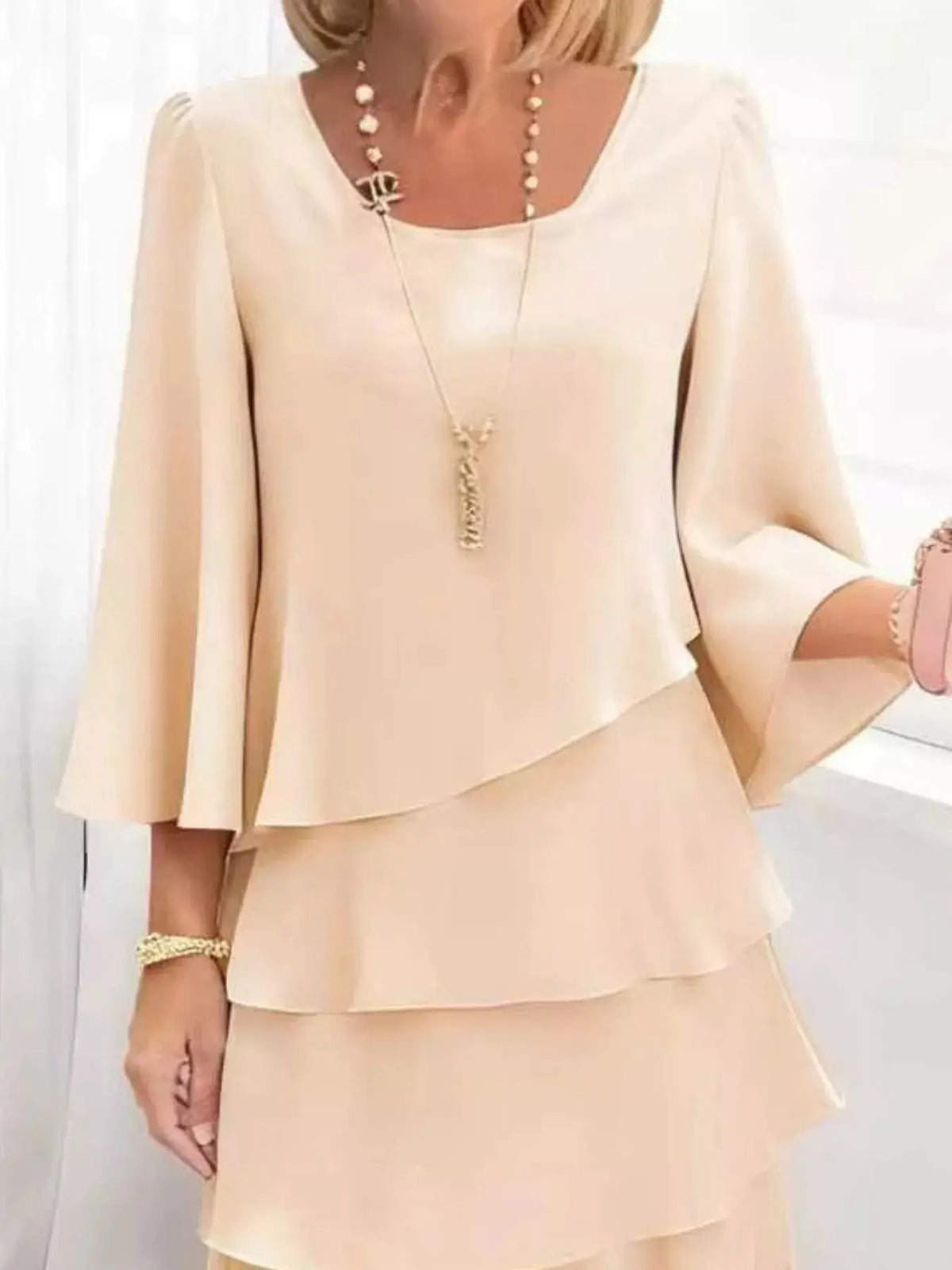 Trendsi plus-size beige dress with a layered ruffle hem and 3/4 sleeves