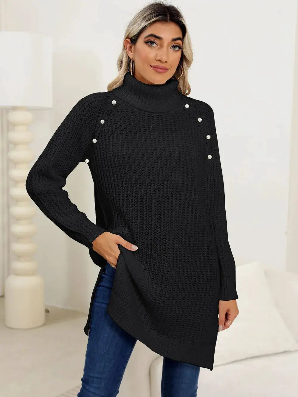 Womens black knit pullover sweater with turtleneck, pearl-embellished shoulders, side slit