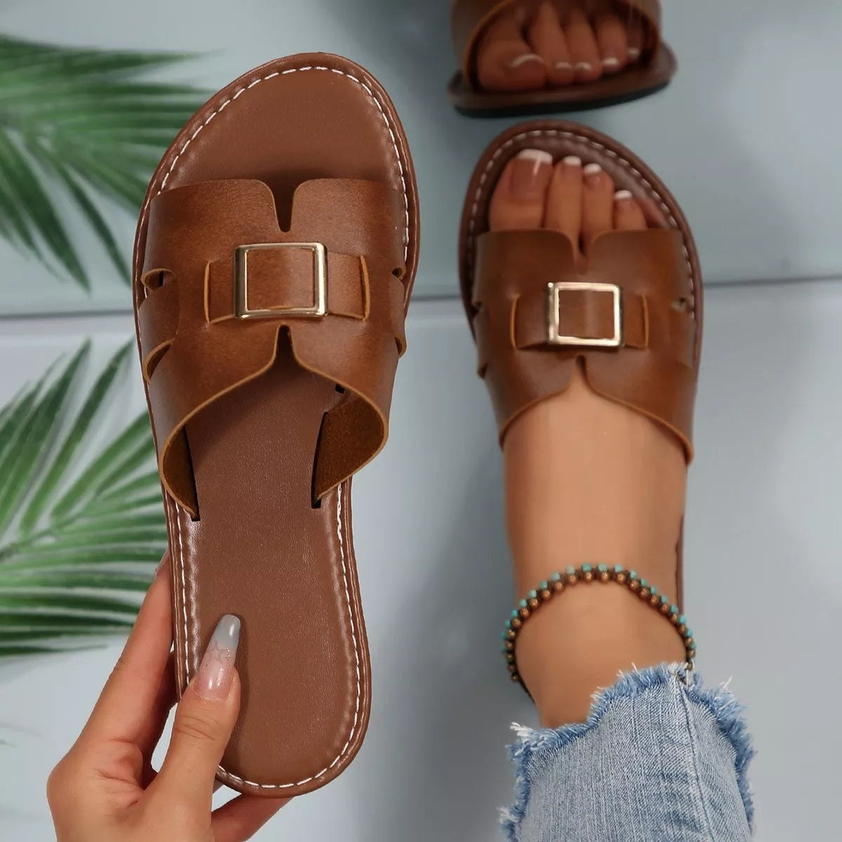 Elegant Buckle Slide Sandals by Trendsi, brown leather with gold buckle; two sandals shown.