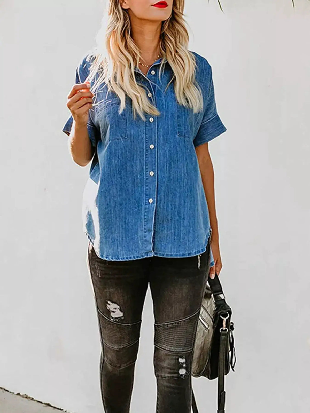 Casual short-sleeve denim shirt with button front and side pockets, blue.