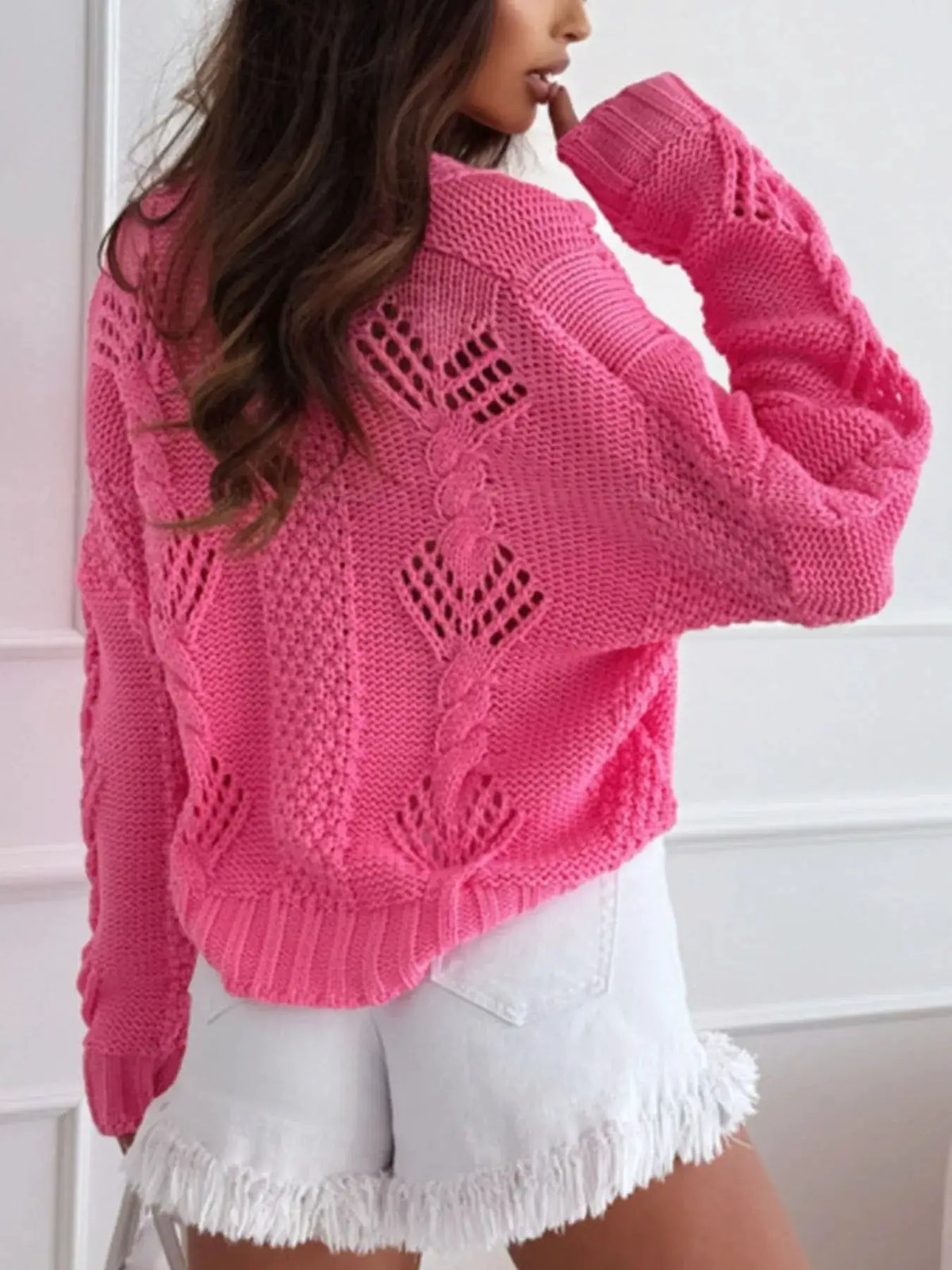 Cardigan in pink, button-up V-neck openwork knit, 100% polyester.