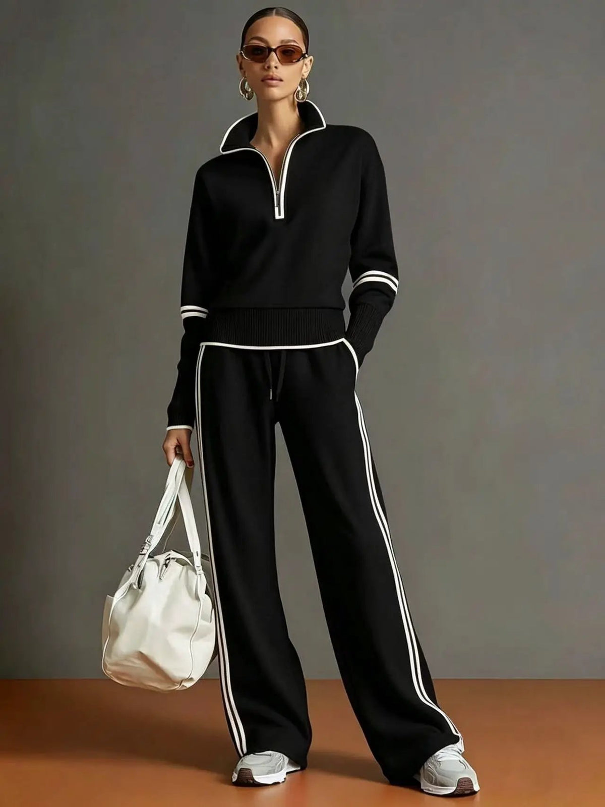 Women’s active cotton long-sleeve two-piece sports set by AdTec in black with white piping