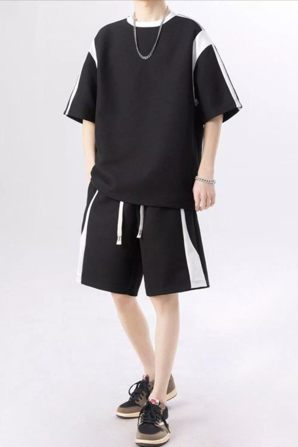 Men's plus-size contrast round-neck top and shorts set in black with white side panels