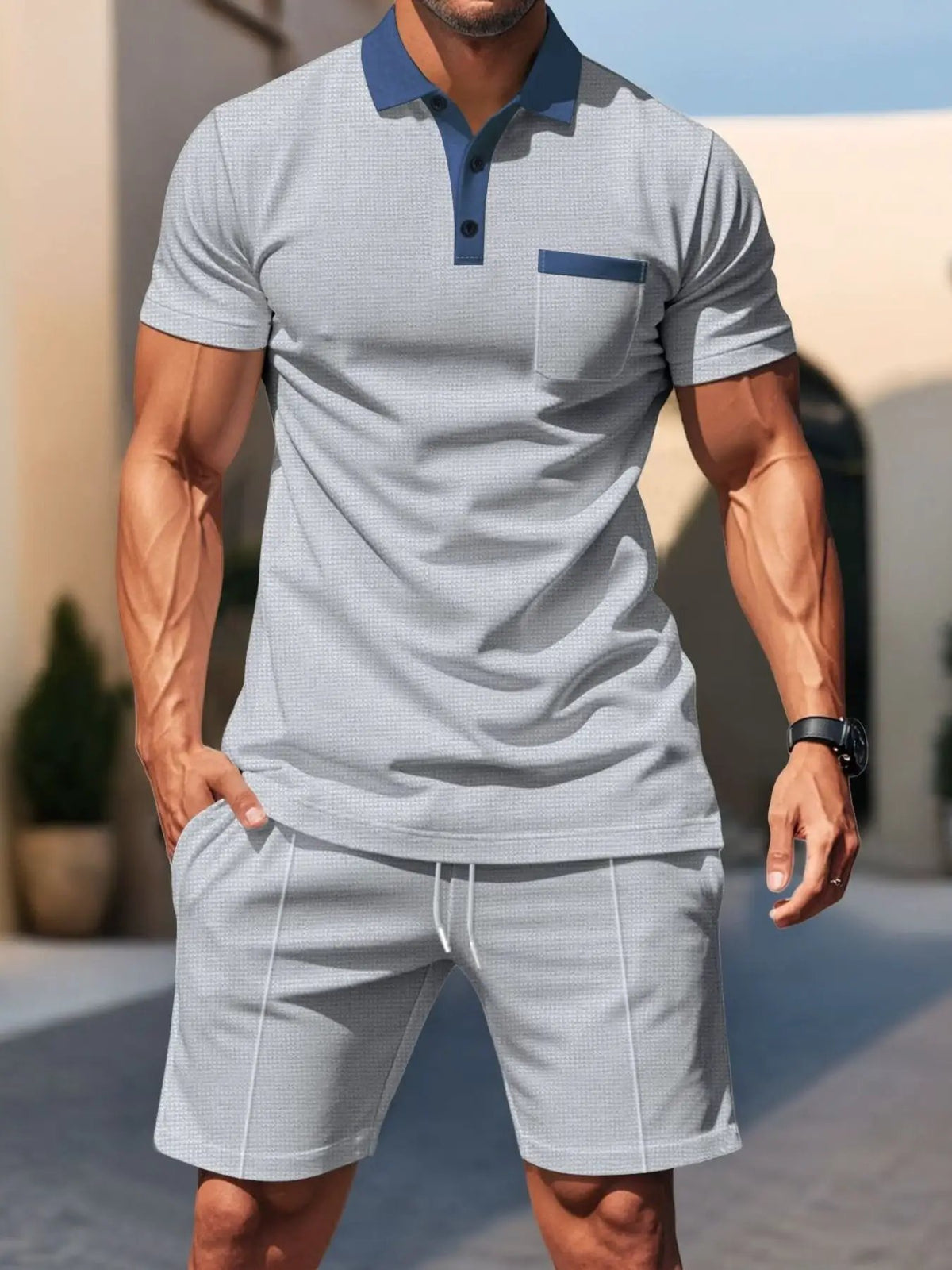Mens casual polo and shorts set in light gray with navy blue collar and chest pocket trim; stretch fit