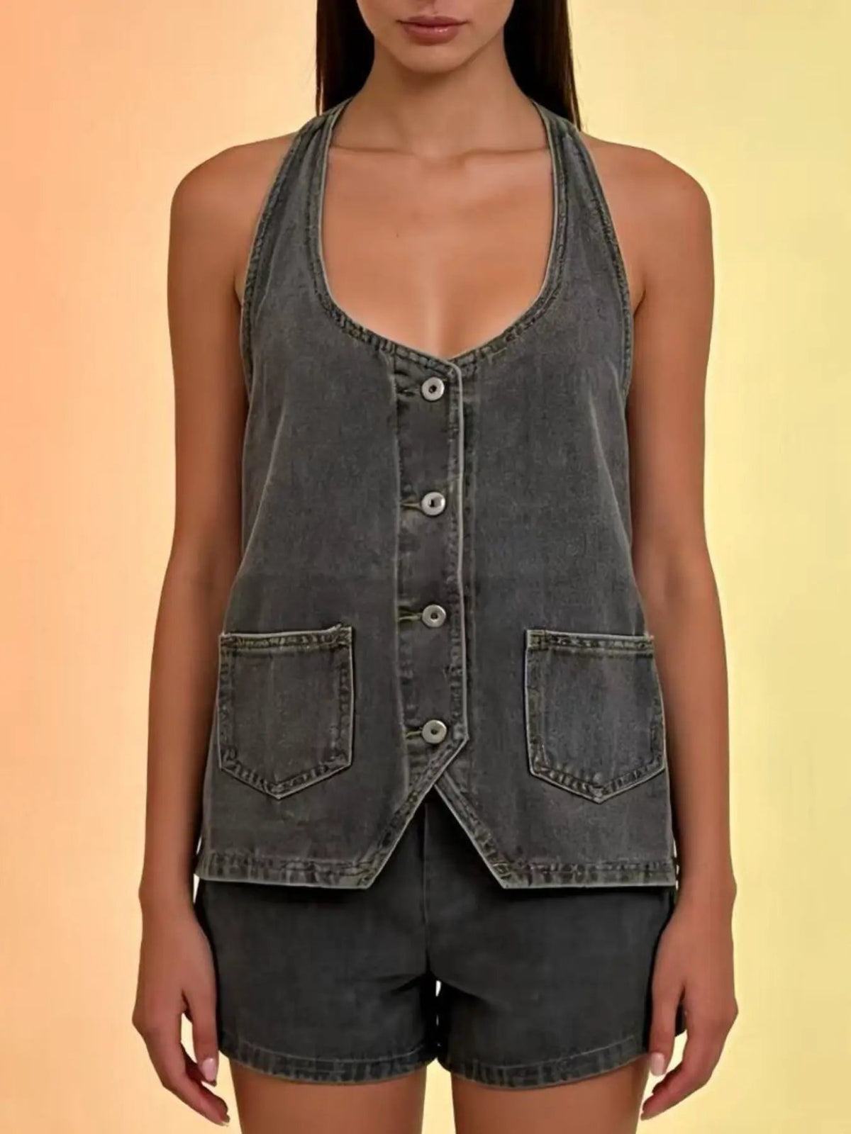 Trendsi halter-neck denim vest with button front and front pockets in dark wash.