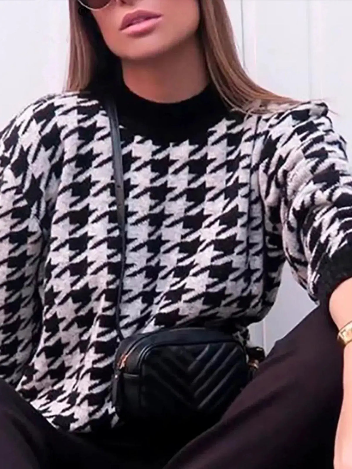 Classic oversized houndstooth sweater by Trendsi in black and white.