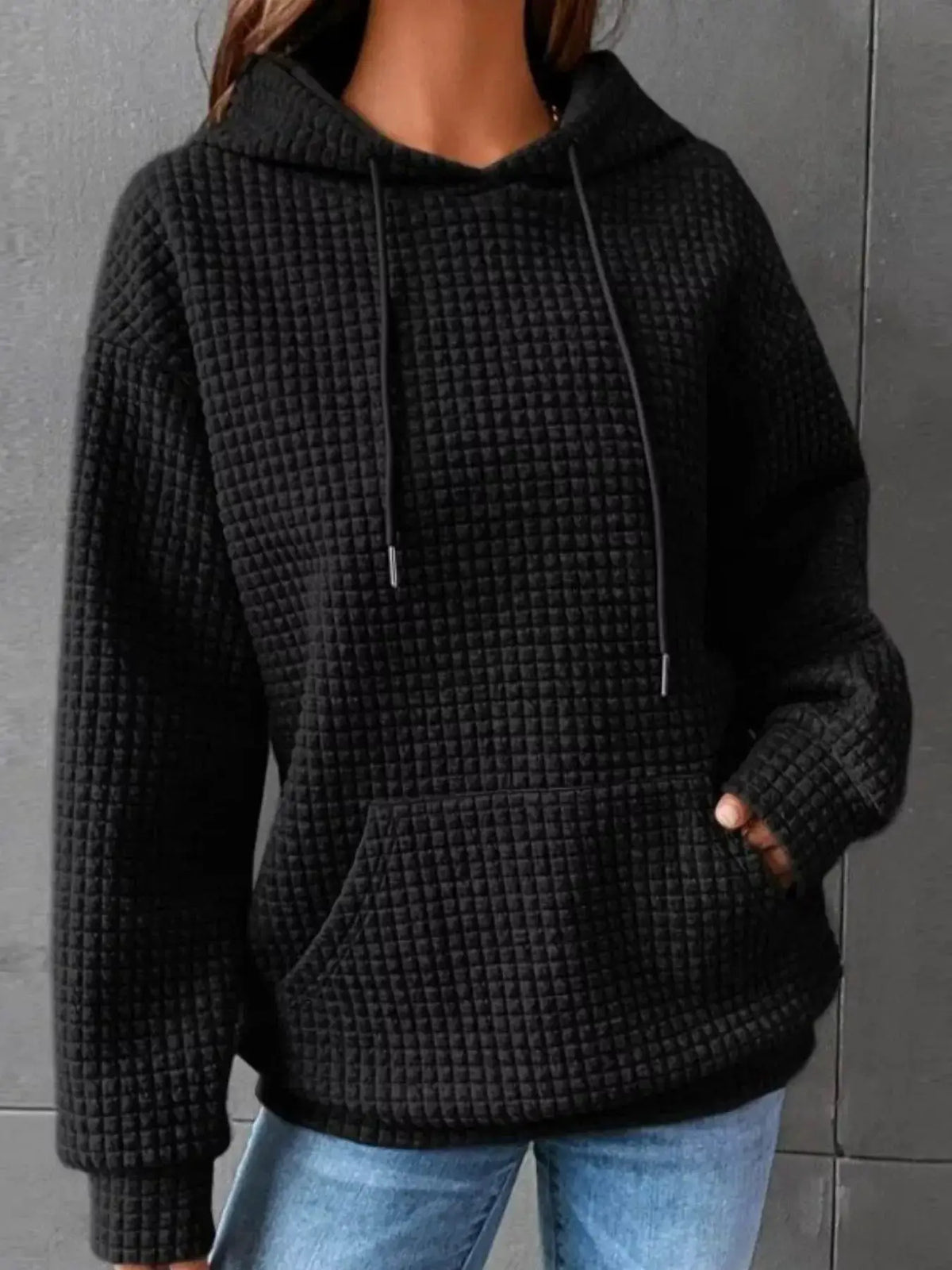Full-size textured kangaroo-pocket hoodie, plus size, black with drawstring hood.