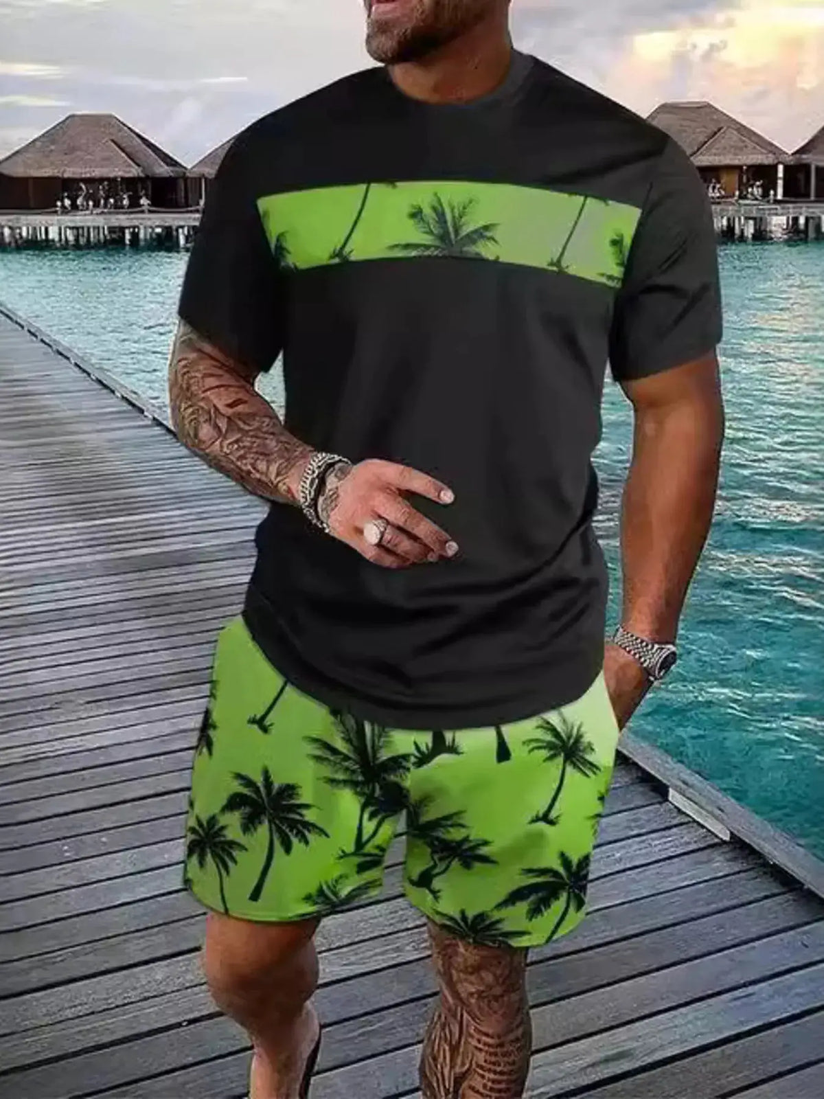 Mens tropical palm tree tee and shorts set, black tee with lime palm stripe and lime palm-print shorts.
