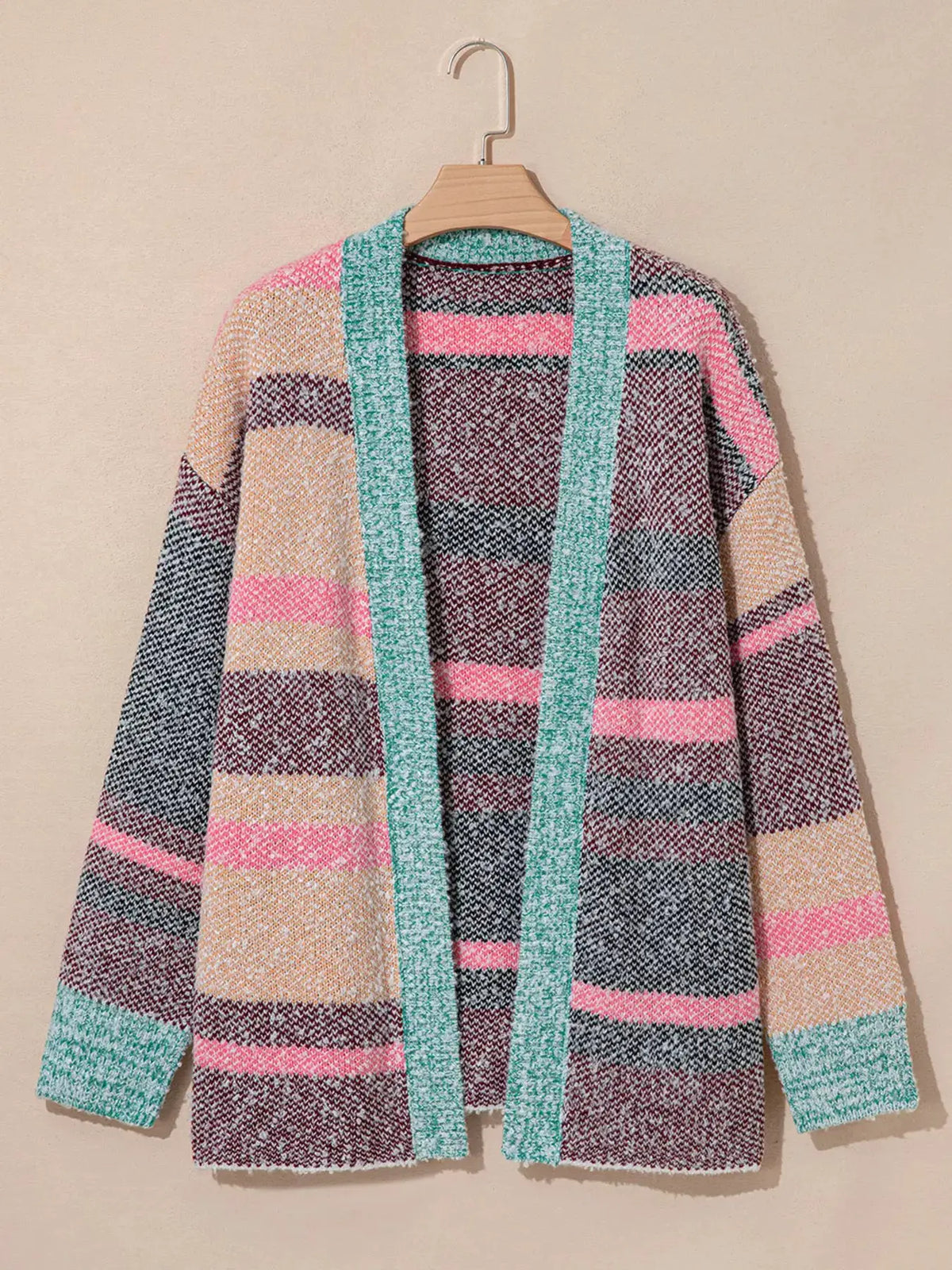 Women's multi-color striped cardigan in soft stretch knit on a hanger; pink, peach, mint and burgundy tones.