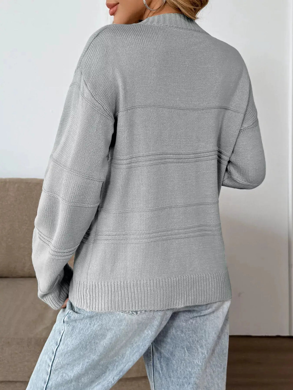 Trendsi lightweight gray knit sweater, back view with dropped shoulders and ribbed hem/cuffs