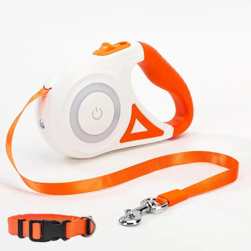 AdTec retractable dog leash with white body, orange handle and strap, metal clip