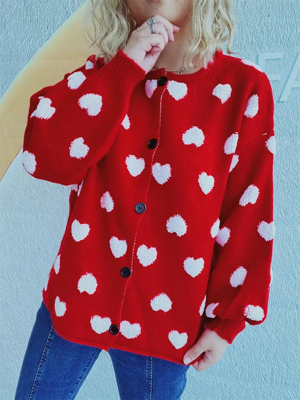 Cozy Heart Button Front Long Sleeve Stretch Knit Cardigan in red with white hearts and black buttons