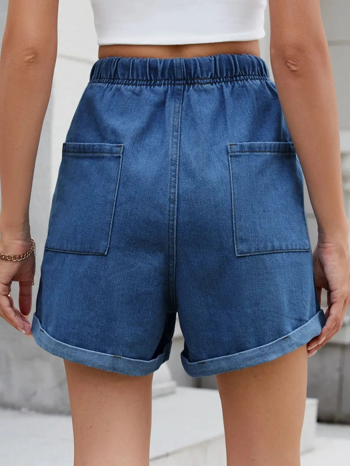 Soft washed drawstring shorts for women, blue denim look, elastic waistband, back pockets, rolled cuffs