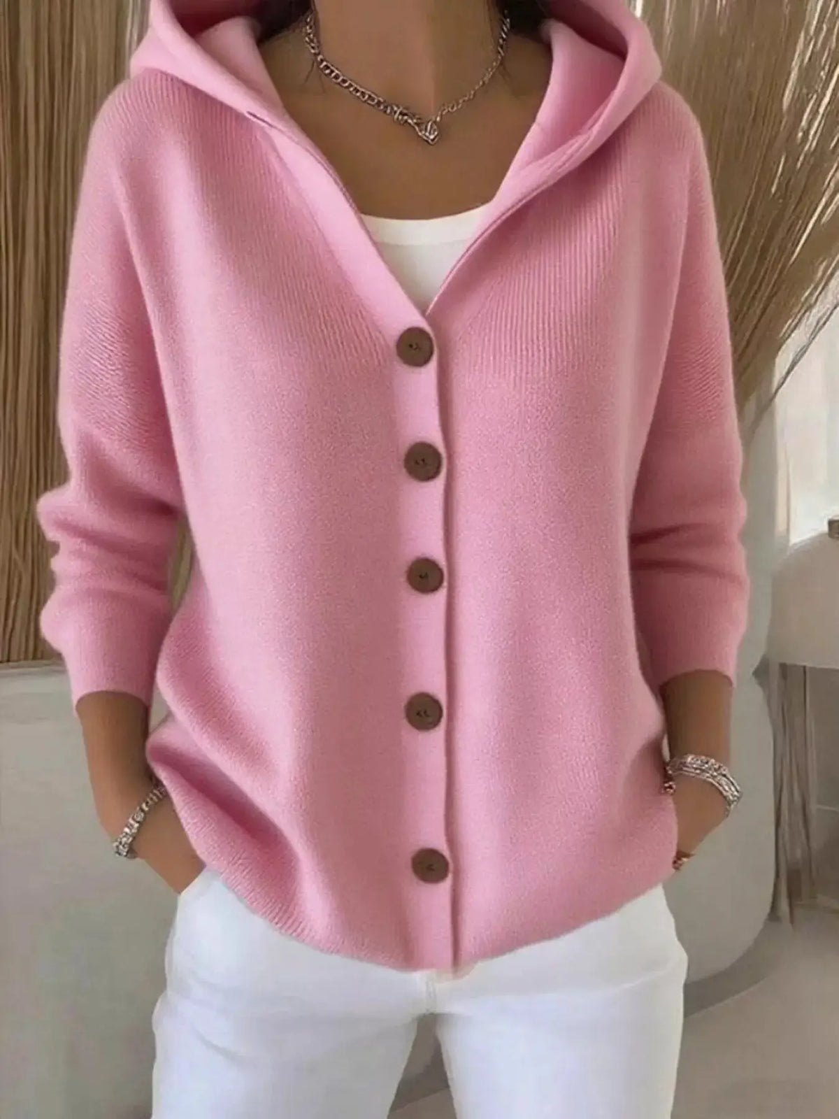 Plus size pink hooded cardigan with button-front closure in soft knit fabric