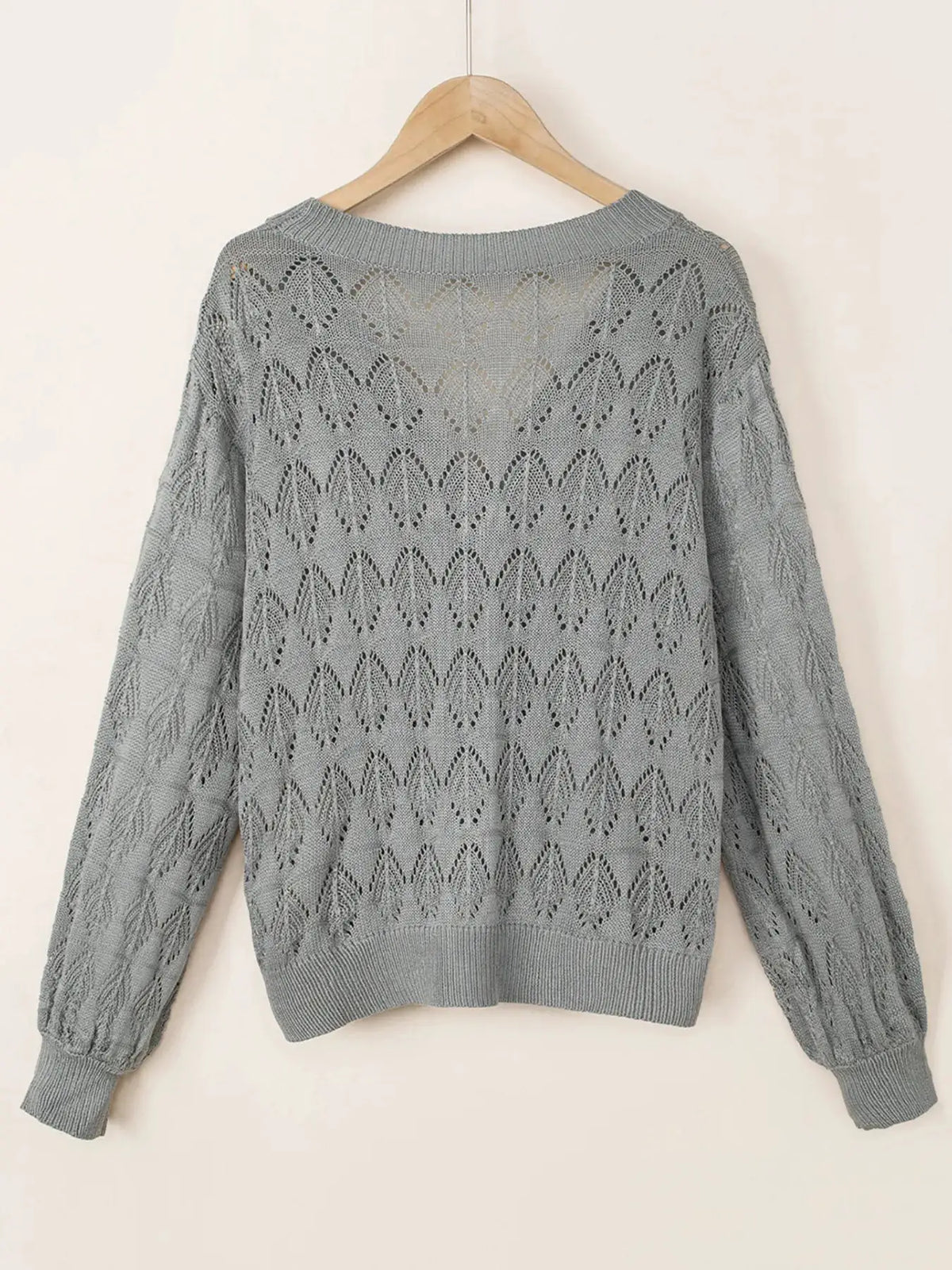 Openwork cardigan in gray by Trendsi with textured knit and ribbed cuffs and hem