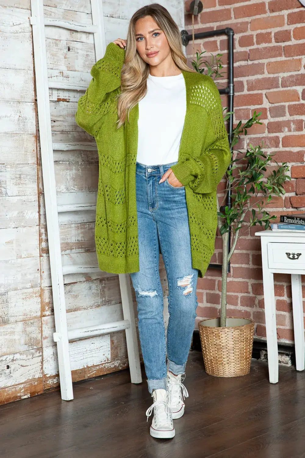 Openwork lime green open-front cardigan with long sleeves; stretchy acrylic.