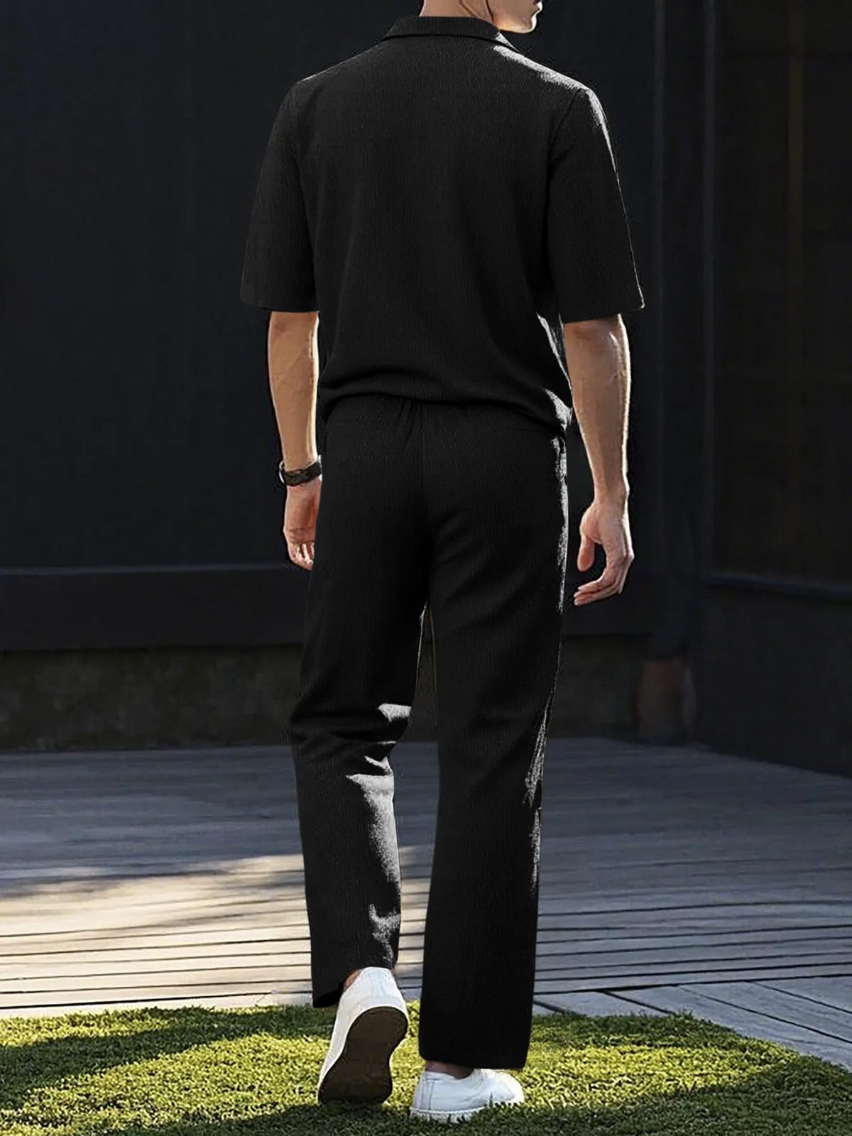 Men's plus-size short-sleeve top and pants set in black knit, pocketed, Trendsi