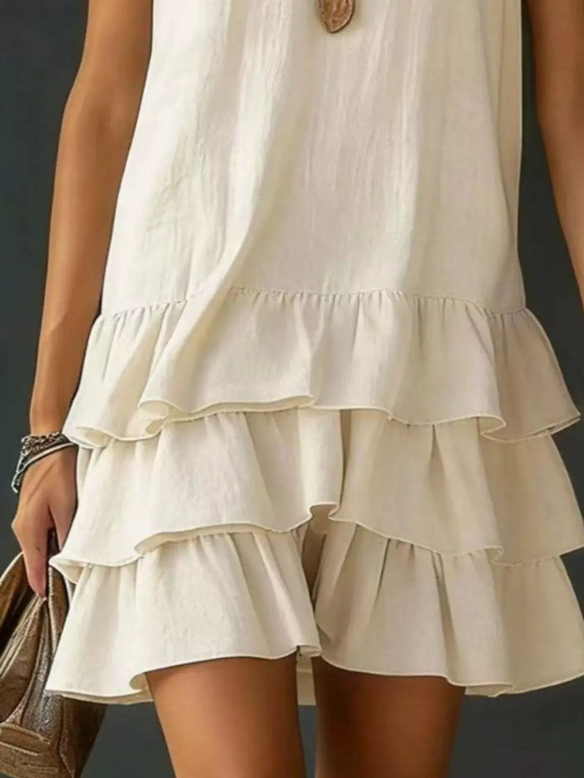 Dress, Trendsi plus-size cream sleeveless V-neck with layered ruffled hem.