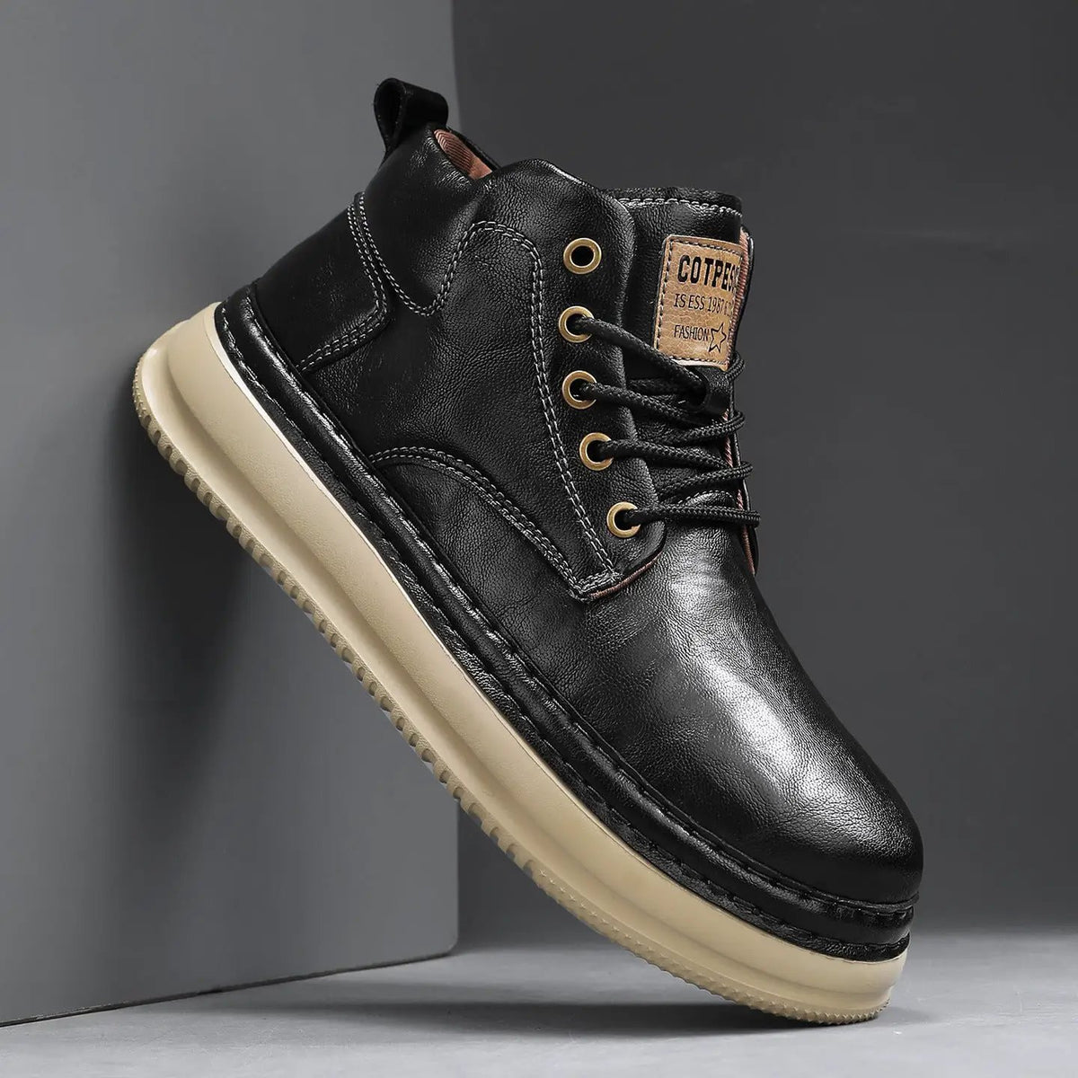 Meridian microfiber mid-top boots with a chunky mid-heel, black upper and beige sole