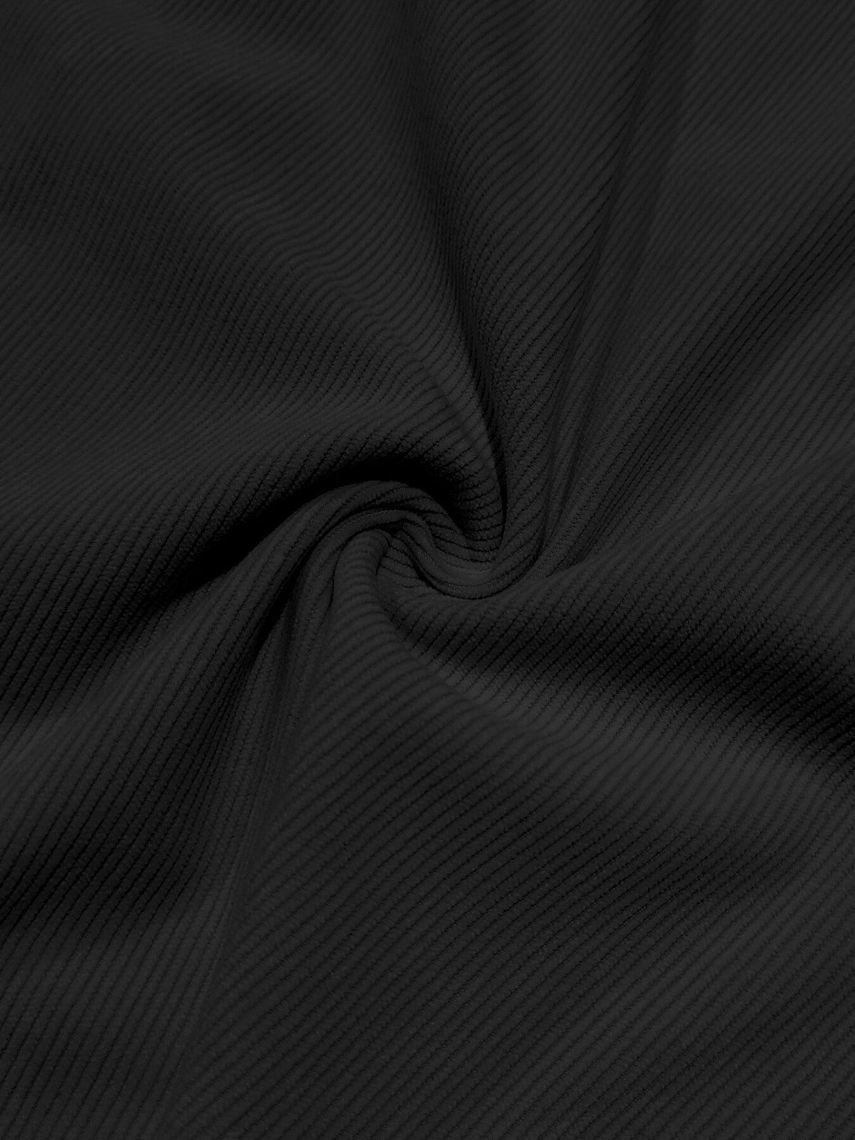 Fabric close-up of black ribbed texture for clothing items