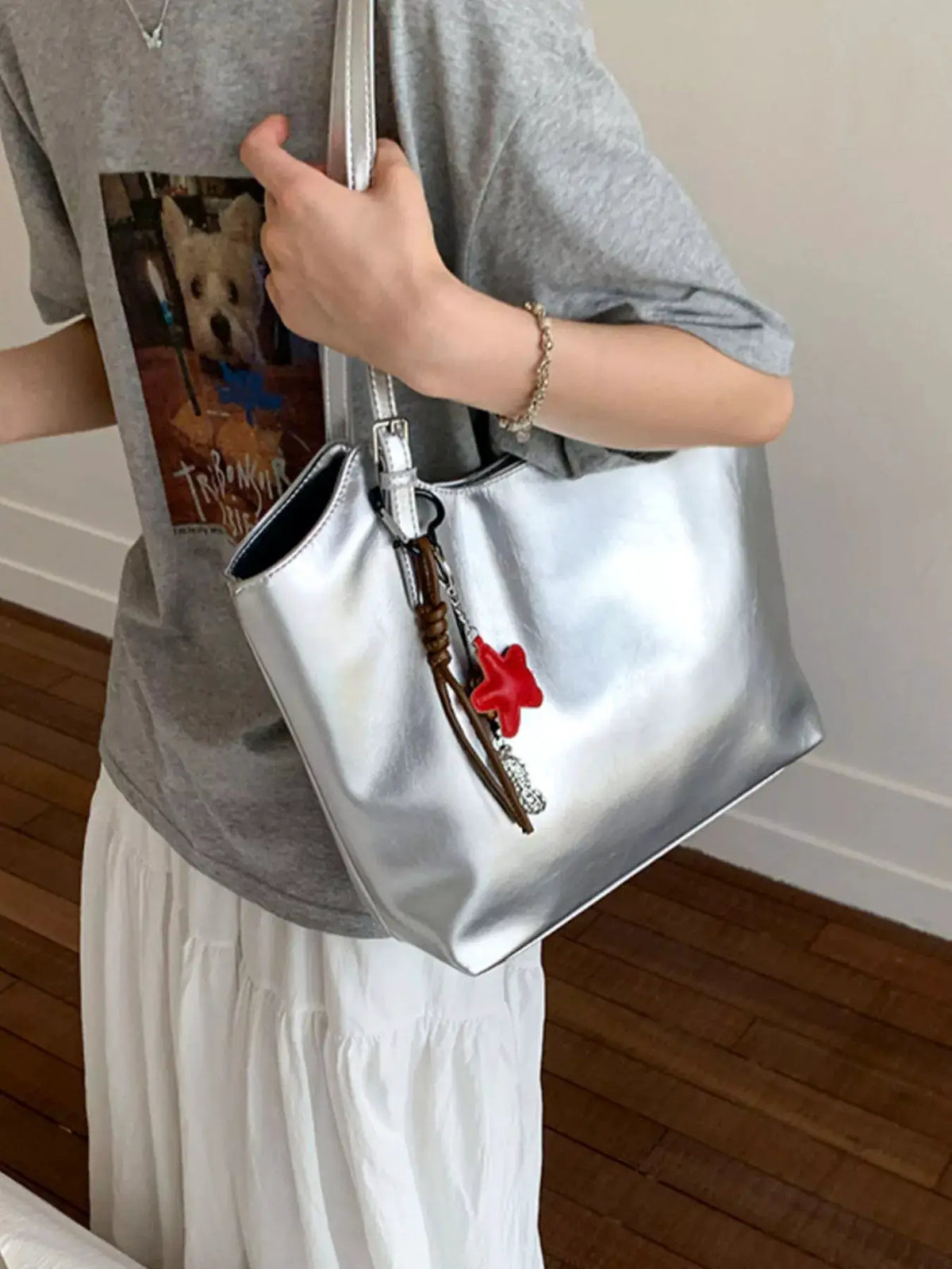 Trendsi PU Leather Shoulder Bag in metallic silver with white strap, brown tassel, and red star charm