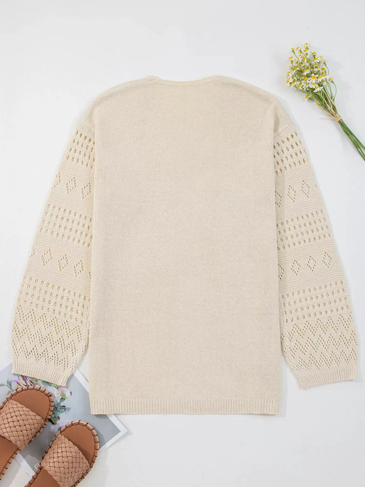 Trendsi beige hollowed-knit open-front cardigan with side pockets and perforated sleeves