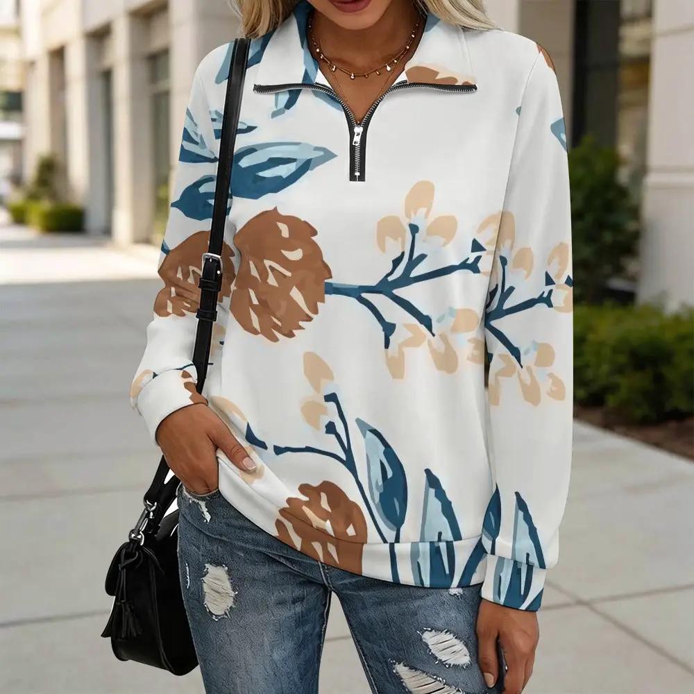 Women's Quarter Zip Sweatshirt in floral print; white base with blue and tan accents, tailored fit