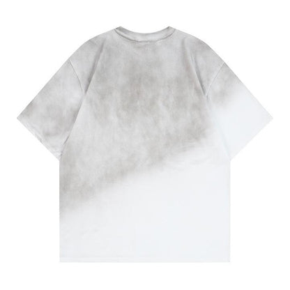 T-shirt à manches courtes avec lettrage estampé à chaud et teinture par pulvérisation