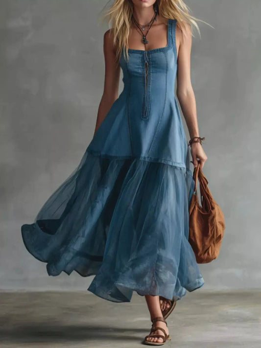 Women’s sleeveless denim patchwork dress with tulle and stretch panels, blue floor-length.