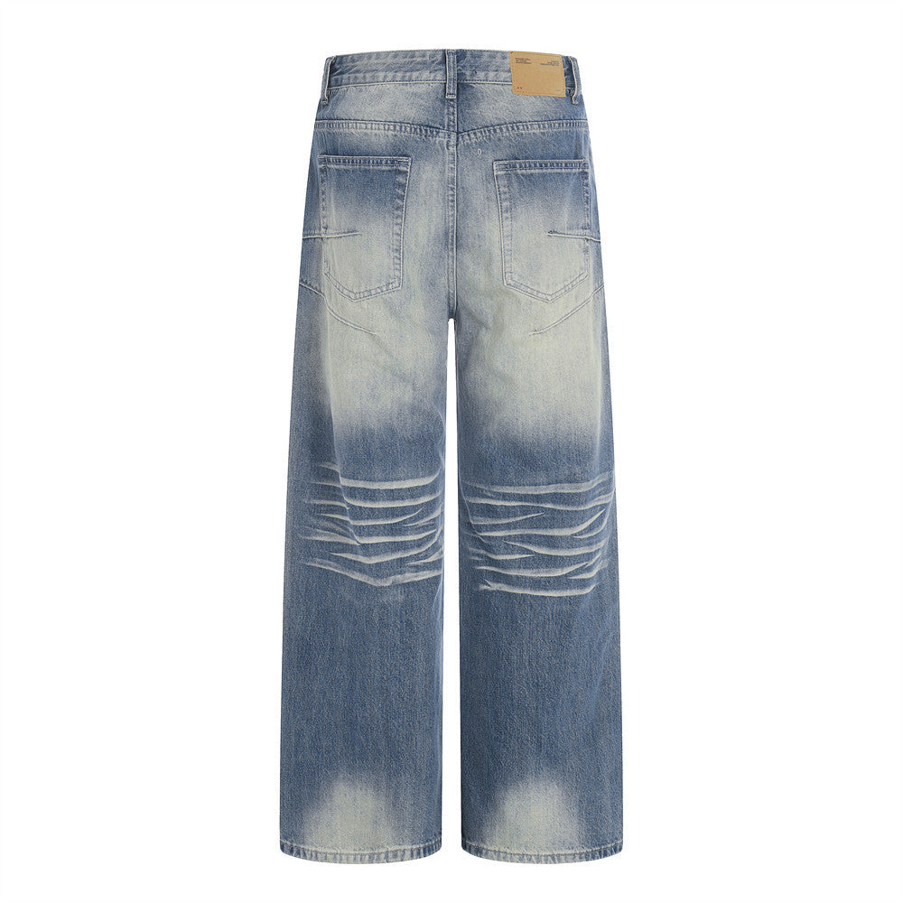 Jeans en jean délavé et poli à empiècements de couleur