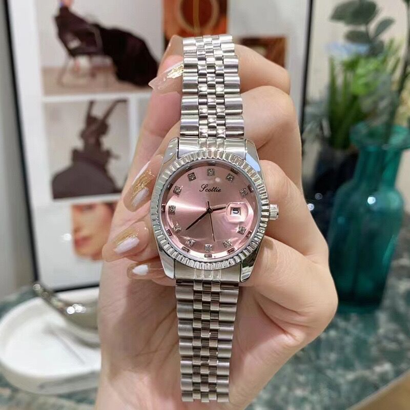 Montre femme simple et élégante en acier avec calendrier
