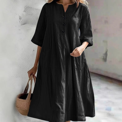 Combinaison ample à trois boutons et poches pour femme