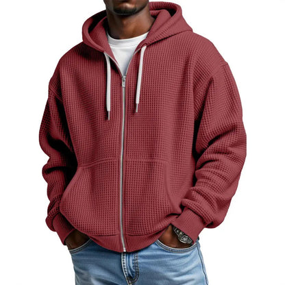Men's burgundy zip-up hoodie with front pockets and ribbed cuffs