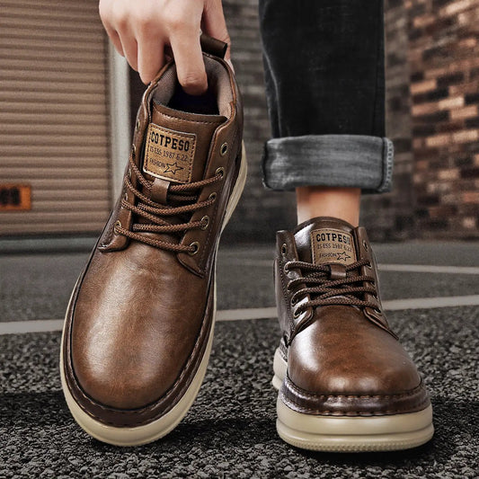 Pair of Meridian Microfiber Mid Top Boots in brown with lace-up front and chunky mid heel
