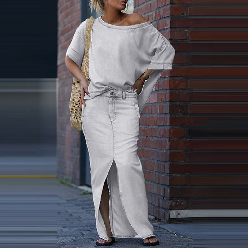 Ensemble jupe deux pièces tendance : haut ample à manches chauve-souris et manches courtes, jupe longue fendue cintrée, patchwork chic. Vêtements pour femmes