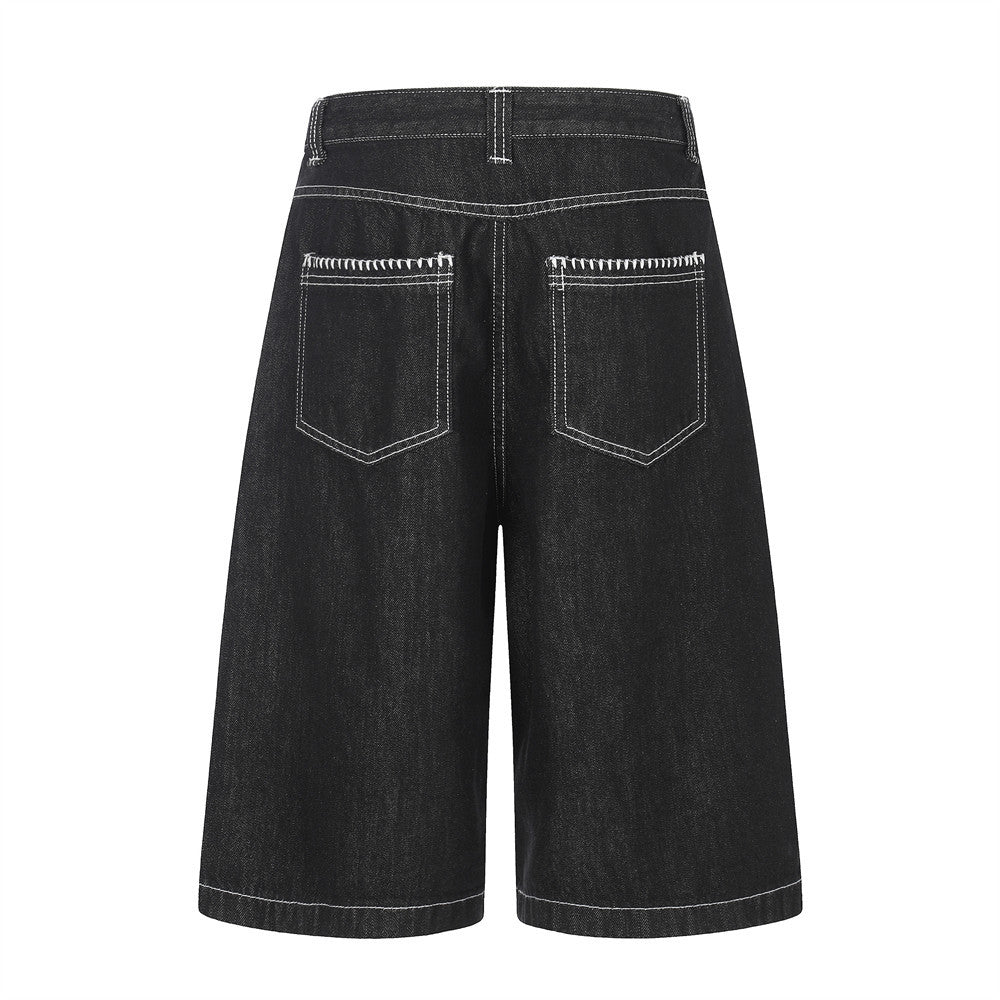 Pantalon de travail à jambe droite, boutonné, longueur cinq-quarts, avec poches et coutures color block.