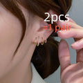 Boucles d'oreilles en argent S925 serties de zircons à quatre griffes