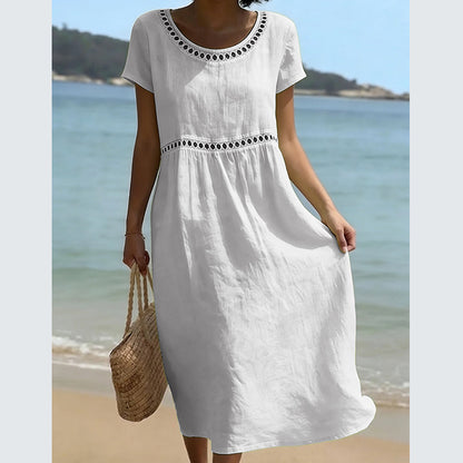 Robe décontractée élégante à col rond, manches trois-quarts et couleur unie
