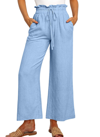 Pantalon large à taille élastique, lacets et coupe courte de couleur unie