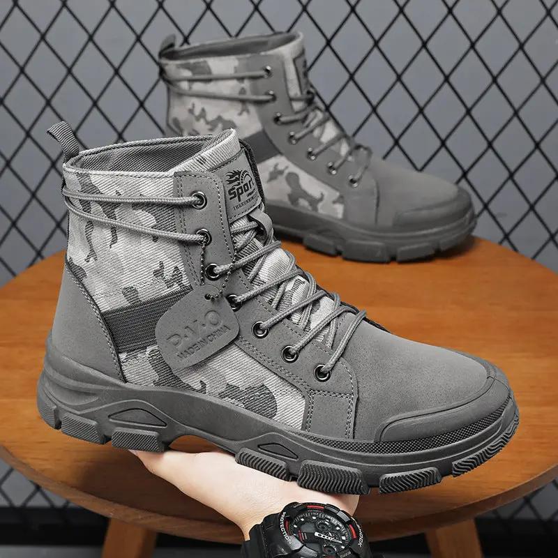 Men's high-top hiking boots by AdTec in gray camouflage with rugged black outsole; pair shown.