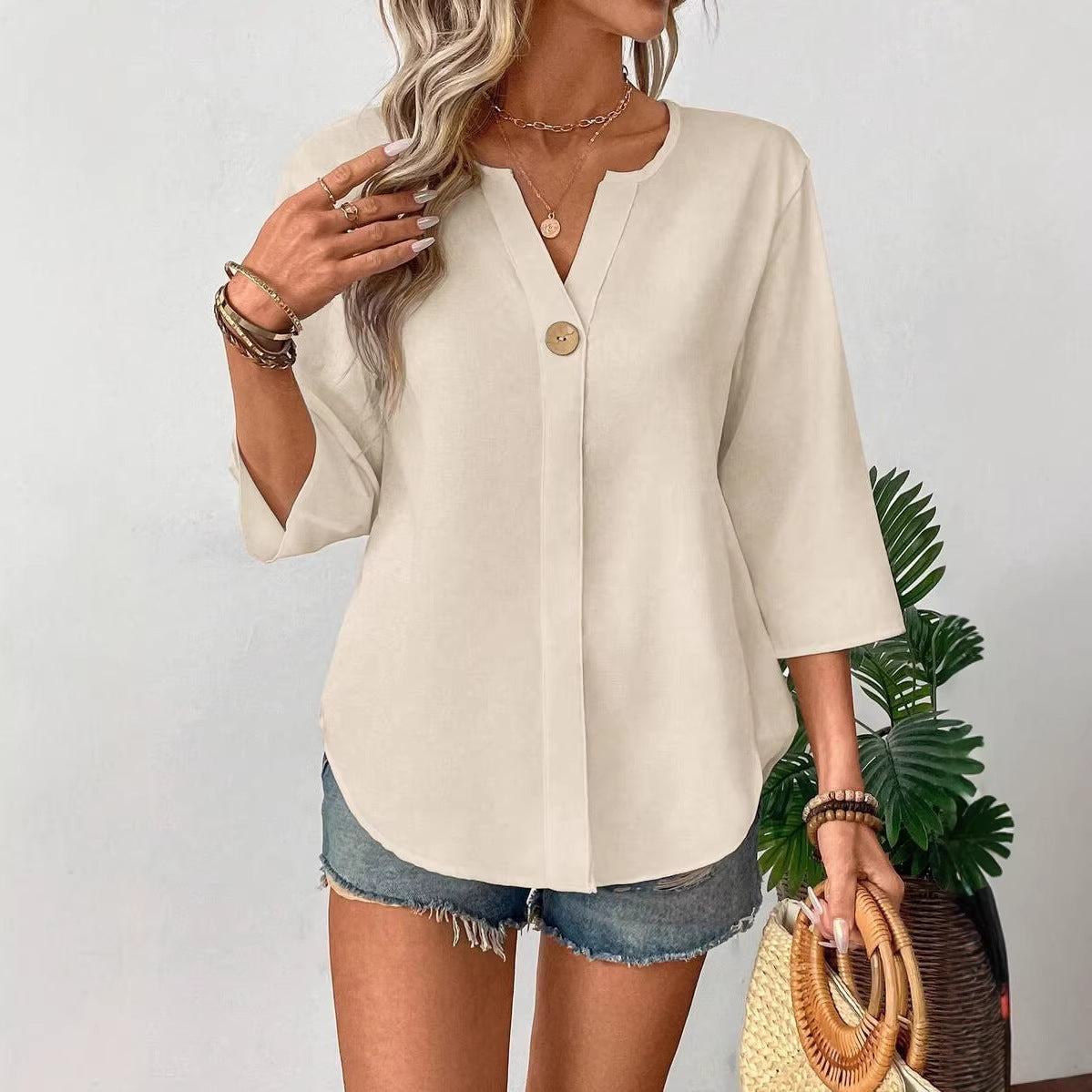 Chemise décontractée unie ample avec petit col en V et boutons
