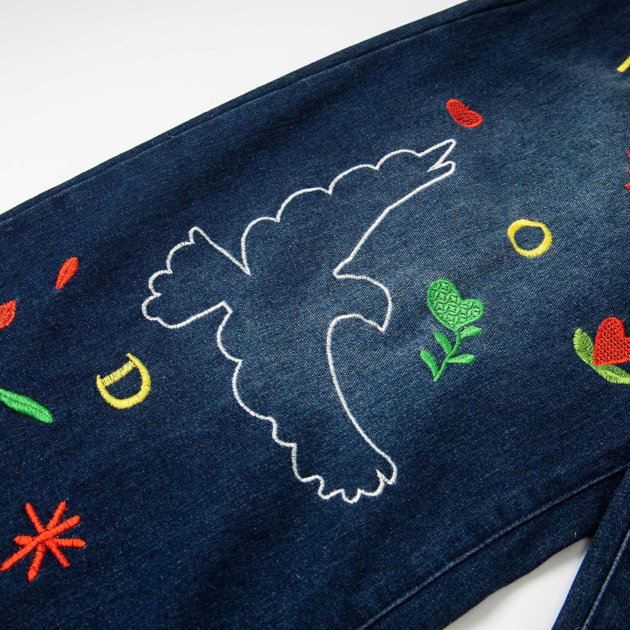 Dapeng Embroidered Cowboy Bending Knife Pants